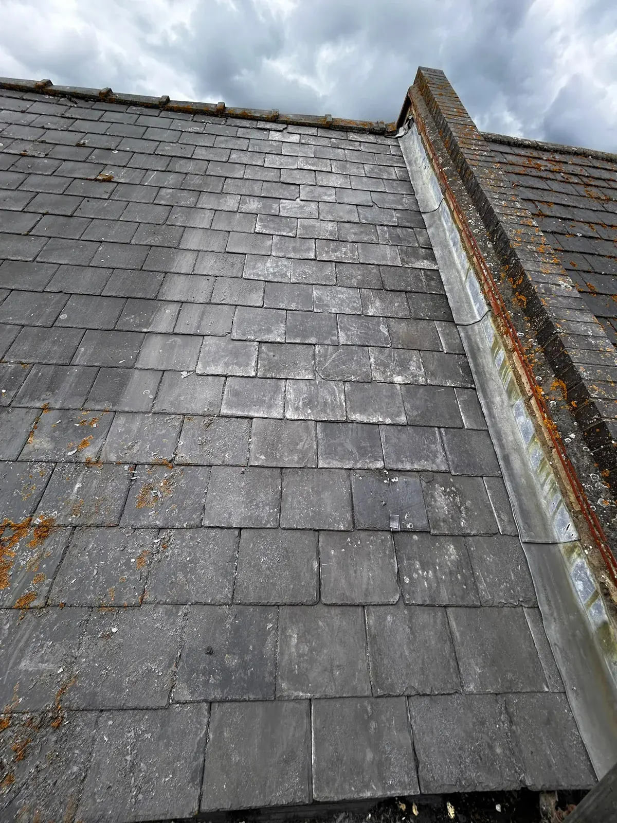 Lead abutment flashing on a slate roof by DJW Roofing & Leadwork